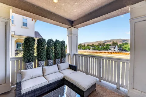 a balcony with furniture