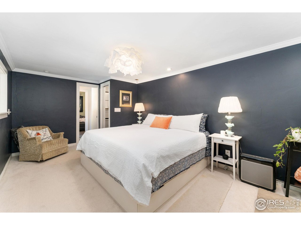 501 Main Street Boulder, CO 80302 - Photo 17 of 45 a bedroom with a bed and a couch