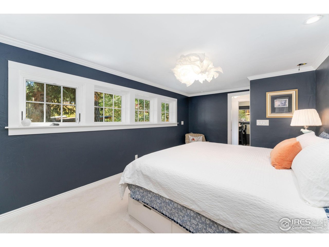 501 Main Street Boulder, CO 80302 - Photo 18 of 45 a bedroom with a bed and a window