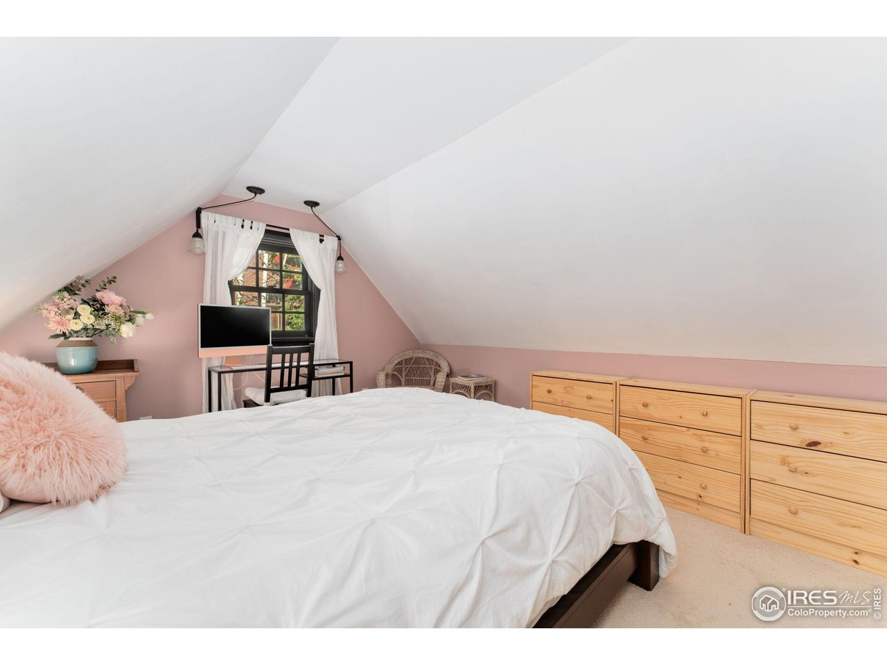 501 Main Street Boulder, CO 80302 - Photo 22 of 45 a bedroom with a bed and wooden floor