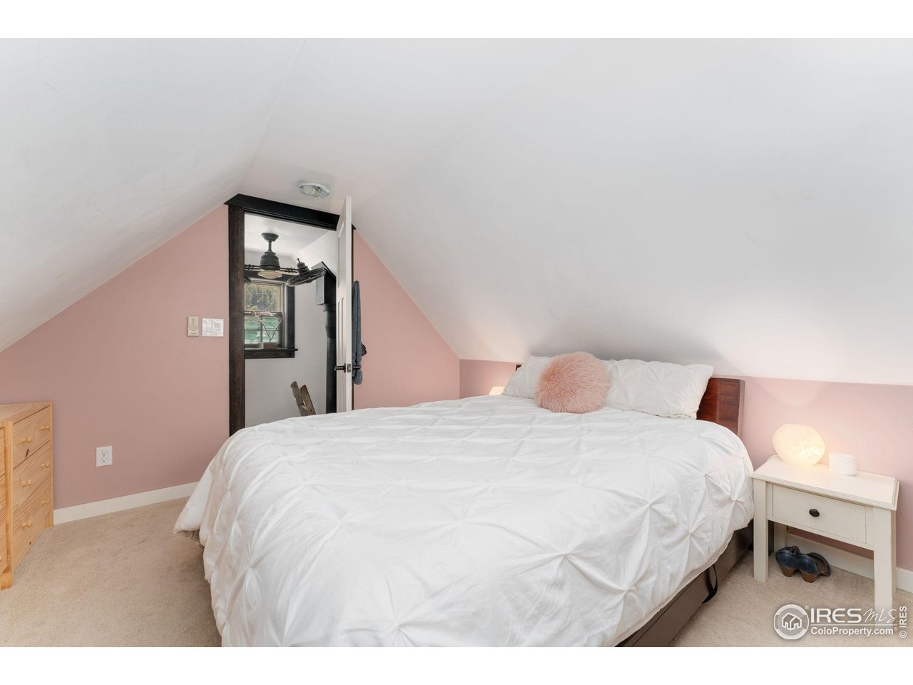 501 Main Street Boulder, CO 80302 - Photo 24 of 45 a bedroom with a bed and a night stand