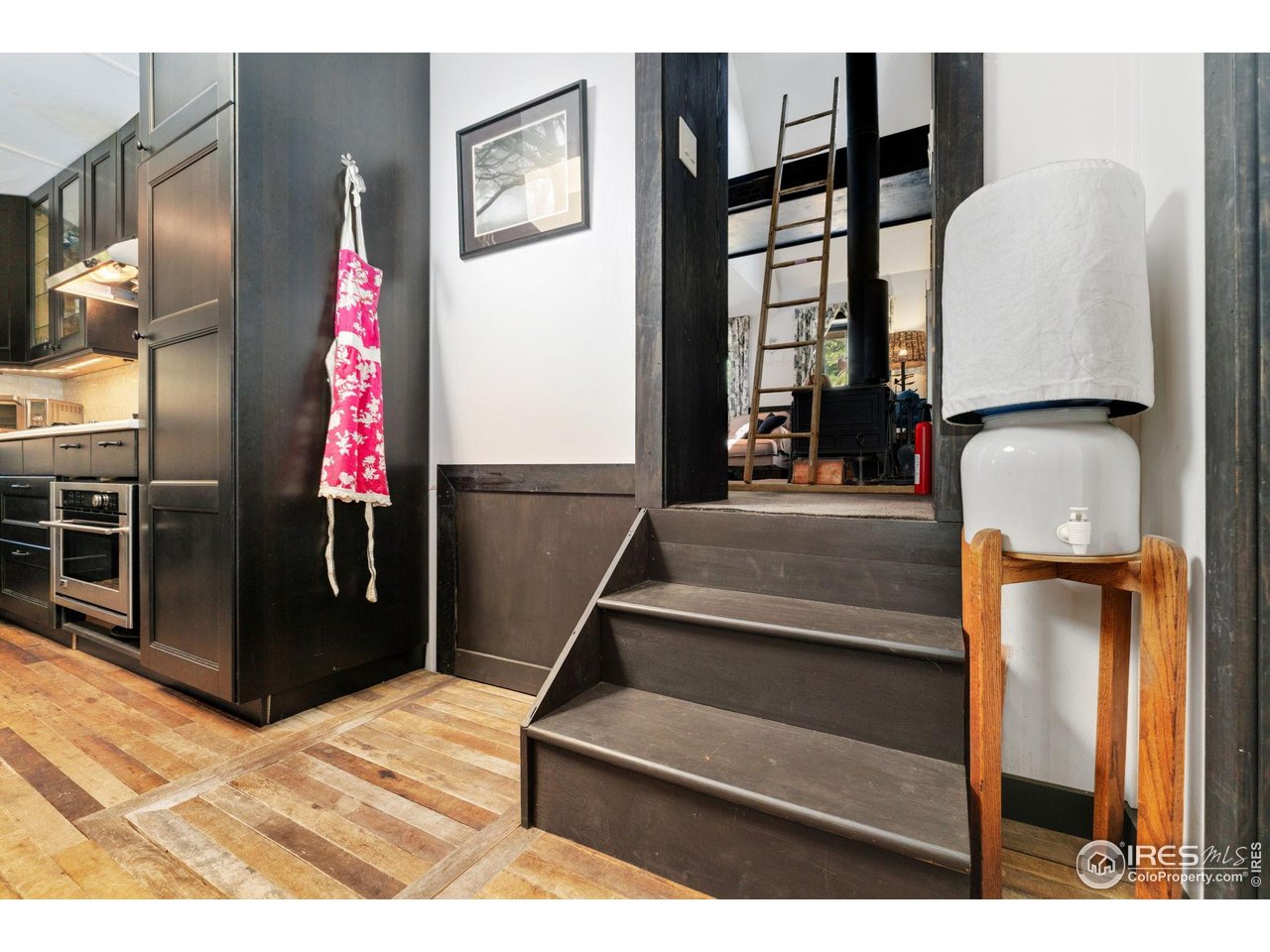 501 Main Street Boulder, CO 80302 - Photo 25 of 45 a view of staircase with a rug and a window