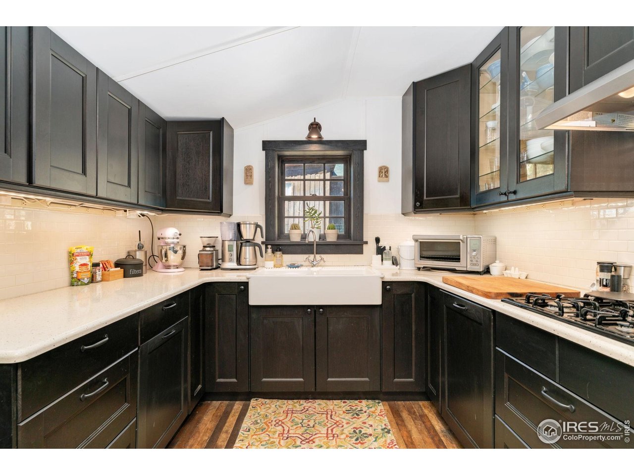 501 Main Street Boulder, CO 80302 - Photo 5 of 45 a kitchen with a sink and cabinets