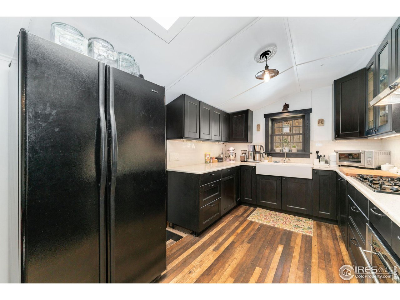 501 Main Street Boulder, CO 80302 - Photo 8 of 45 a large kitchen with a refrigerator and a sink