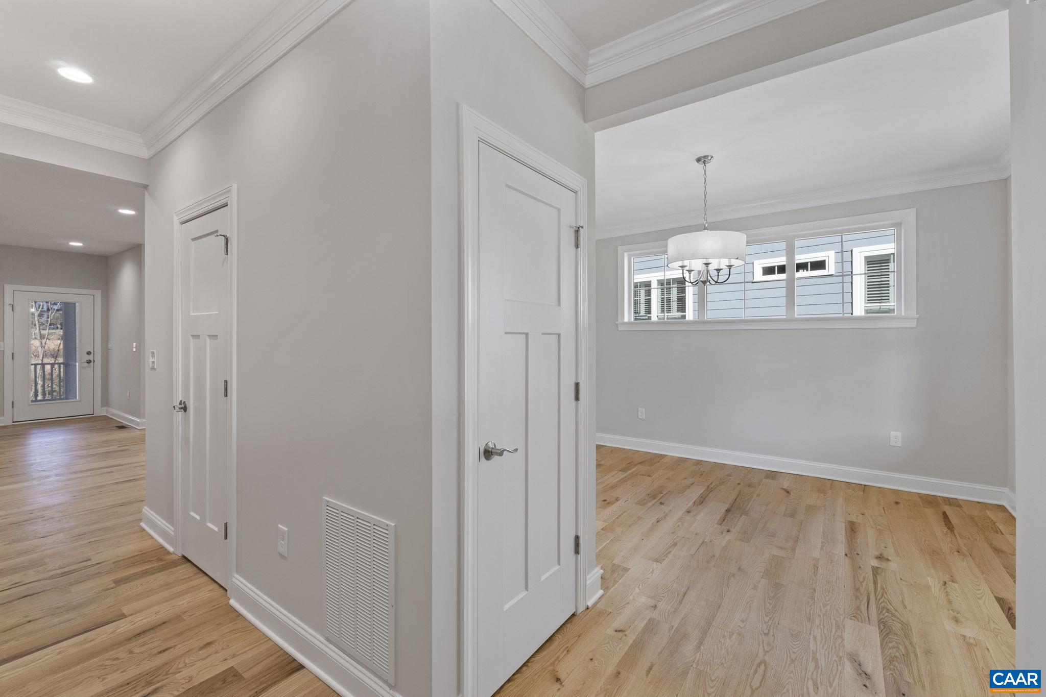 2230 Fowler Circle Charlottesville, VA 22901 - Photo 13 of 58 wooden floor in an empty room with a window
