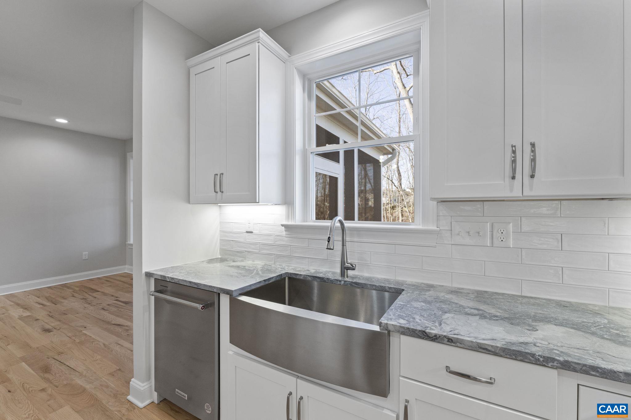 2230 Fowler Circle Charlottesville, VA 22901 - Photo 25 of 58 a kitchen with stainless steel appliances granite countertop a sink and a white cabinets