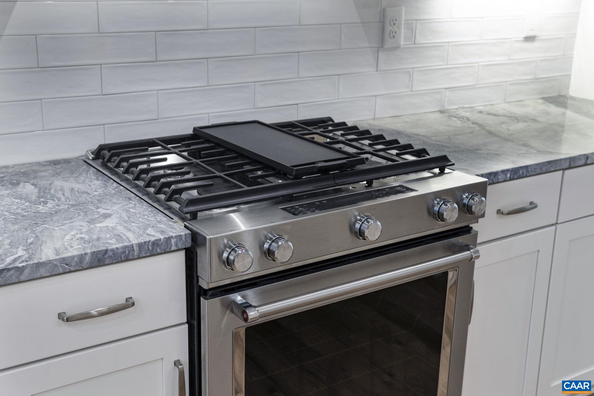 2230 Fowler Circle Charlottesville, VA 22901 - Photo 28 of 58 a stove top oven sitting inside of a kitchen