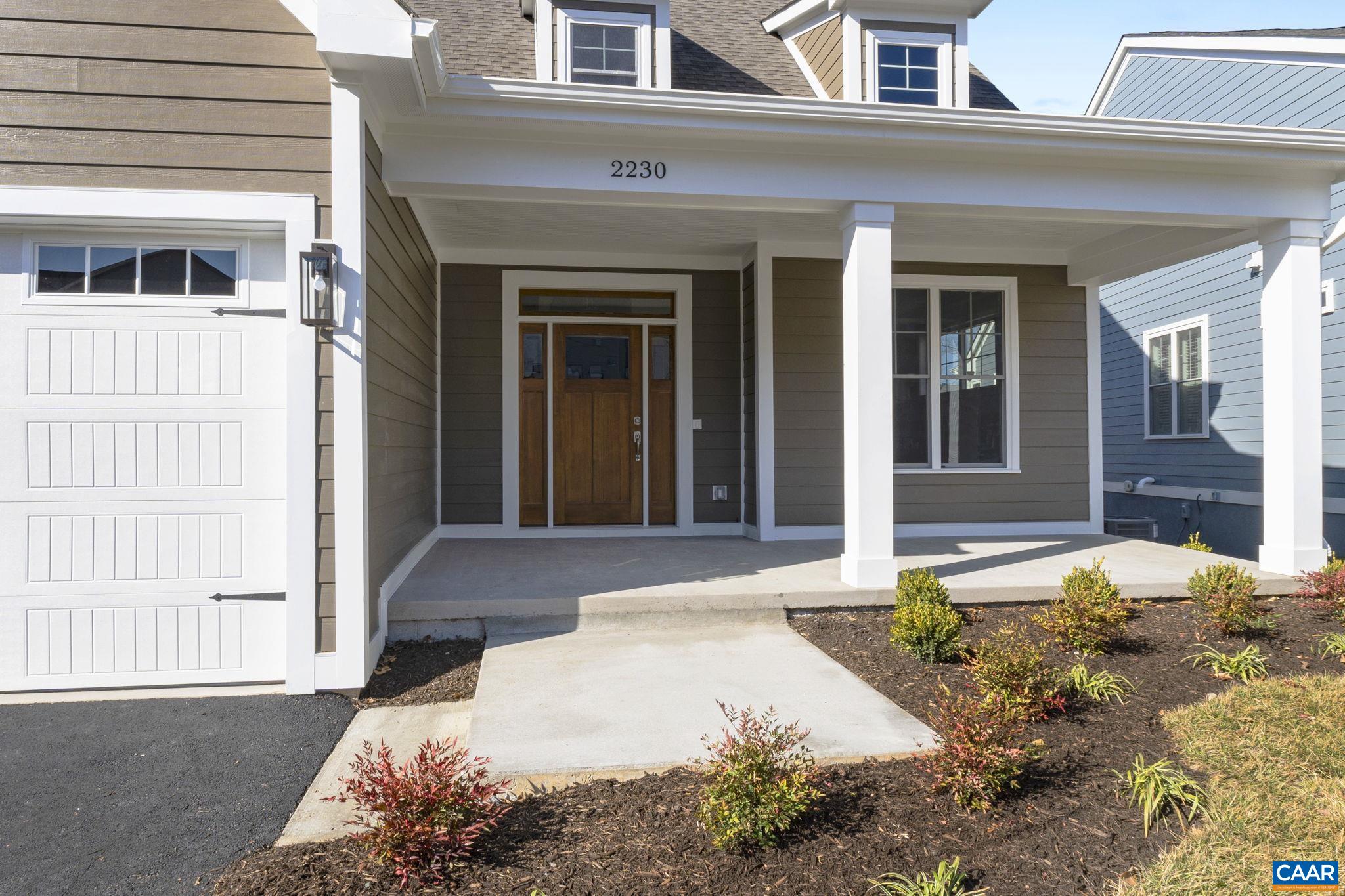 2230 Fowler Circle Charlottesville, VA 22901 - Photo 3 of 58 a front view of a house with a yard