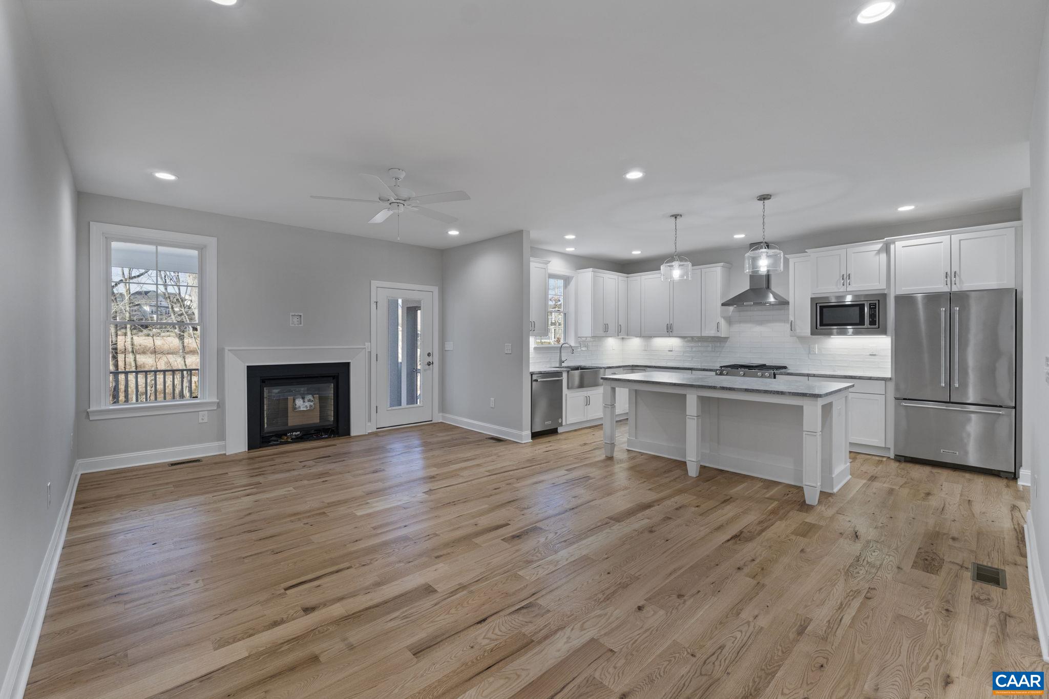 2230 Fowler Circle Charlottesville, VA 22901 - Photo 31 of 58 a kitchen with a refrigerator and a stove top oven