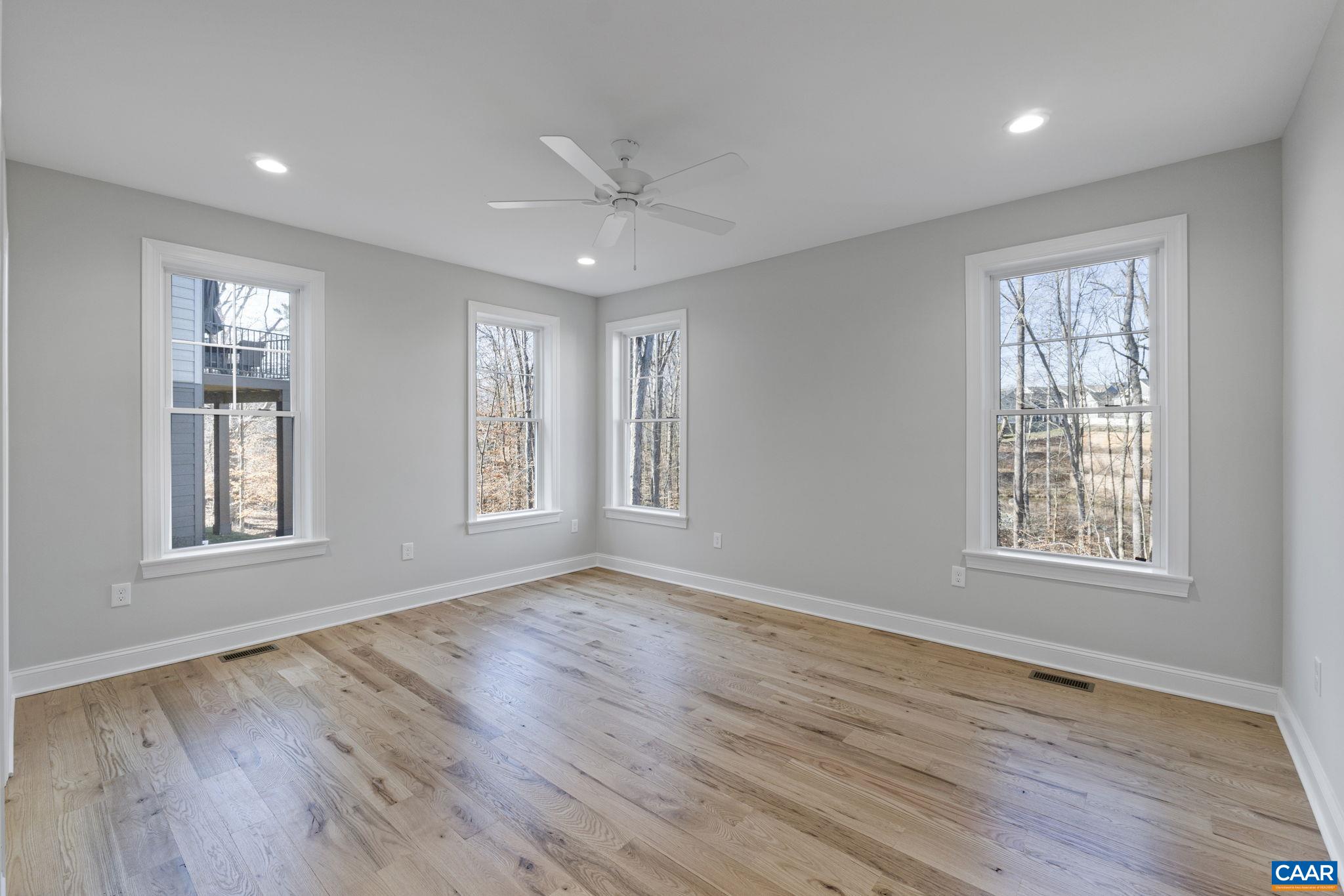 2230 Fowler Circle Charlottesville, VA 22901 - Photo 36 of 58 a view of an empty room with wooden floor and a window