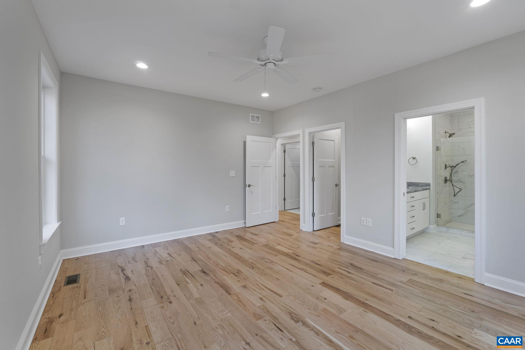 2230 Fowler Circle Charlottesville, VA 22901 - Photo 37 of 58 a view of a hallway with wooden floor