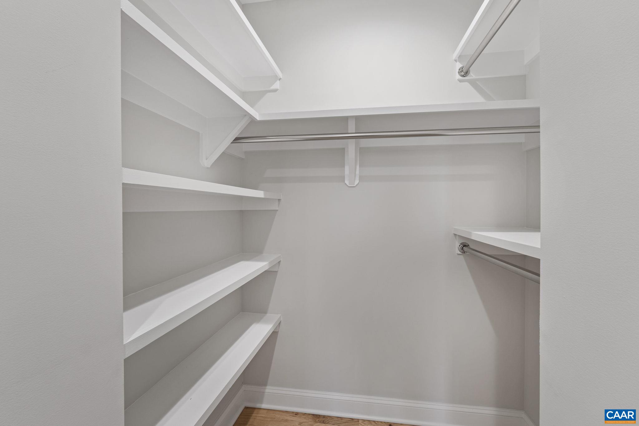 2230 Fowler Circle Charlottesville, VA 22901 - Photo 44 of 58 a view of walk in closet with empty racks