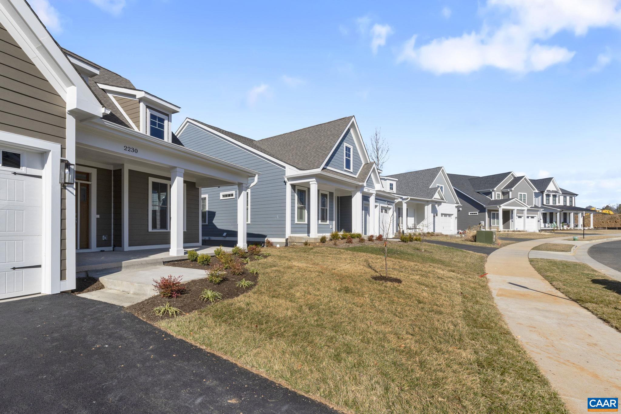 2230 Fowler Circle Charlottesville, VA 22901 - Photo 58 of 58 a front view of a house with a yard