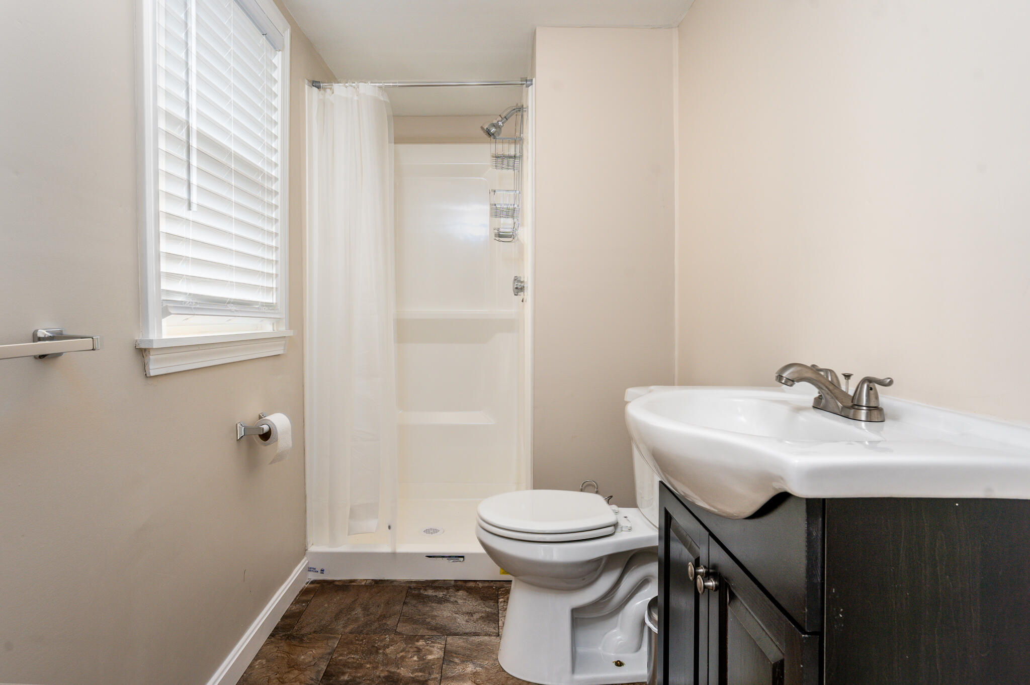 84 Bearses Way Hyannis, MA 02601 - Photo 12 of 36 a bathroom with a sink toilet and vanity