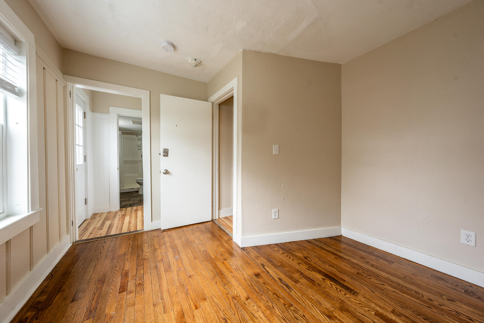 84 Bearses Way Hyannis, MA 02601 - Photo 14 of 36 wooden floor in an empty room