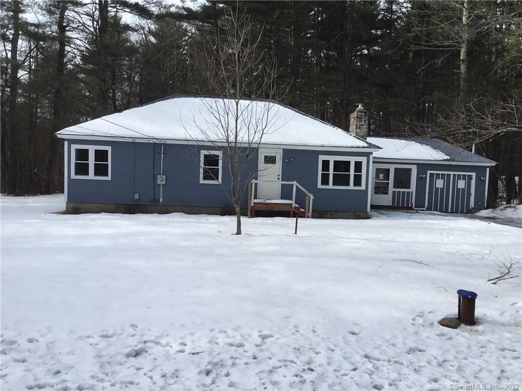 248 Monson Road Stafford, CT 06076 - Photo 1 of 1 a front view of a house with a yard