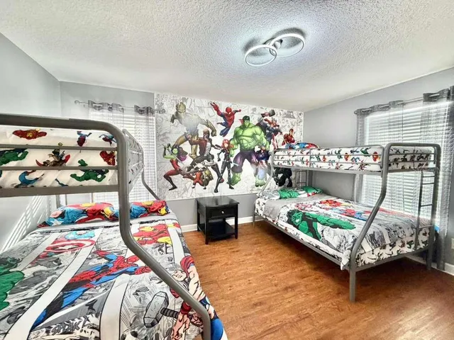 a bathroom with a sink toilet tub and shower