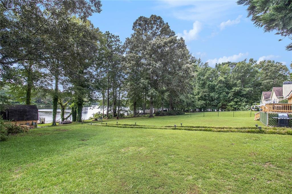 96 Pointe View Court Jackson, GA 30233 - Photo 29 of 36 a view of a golf course with a lake