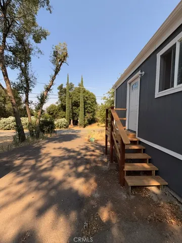 a view of a back yard of the house