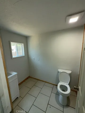 a bathroom with a toilet