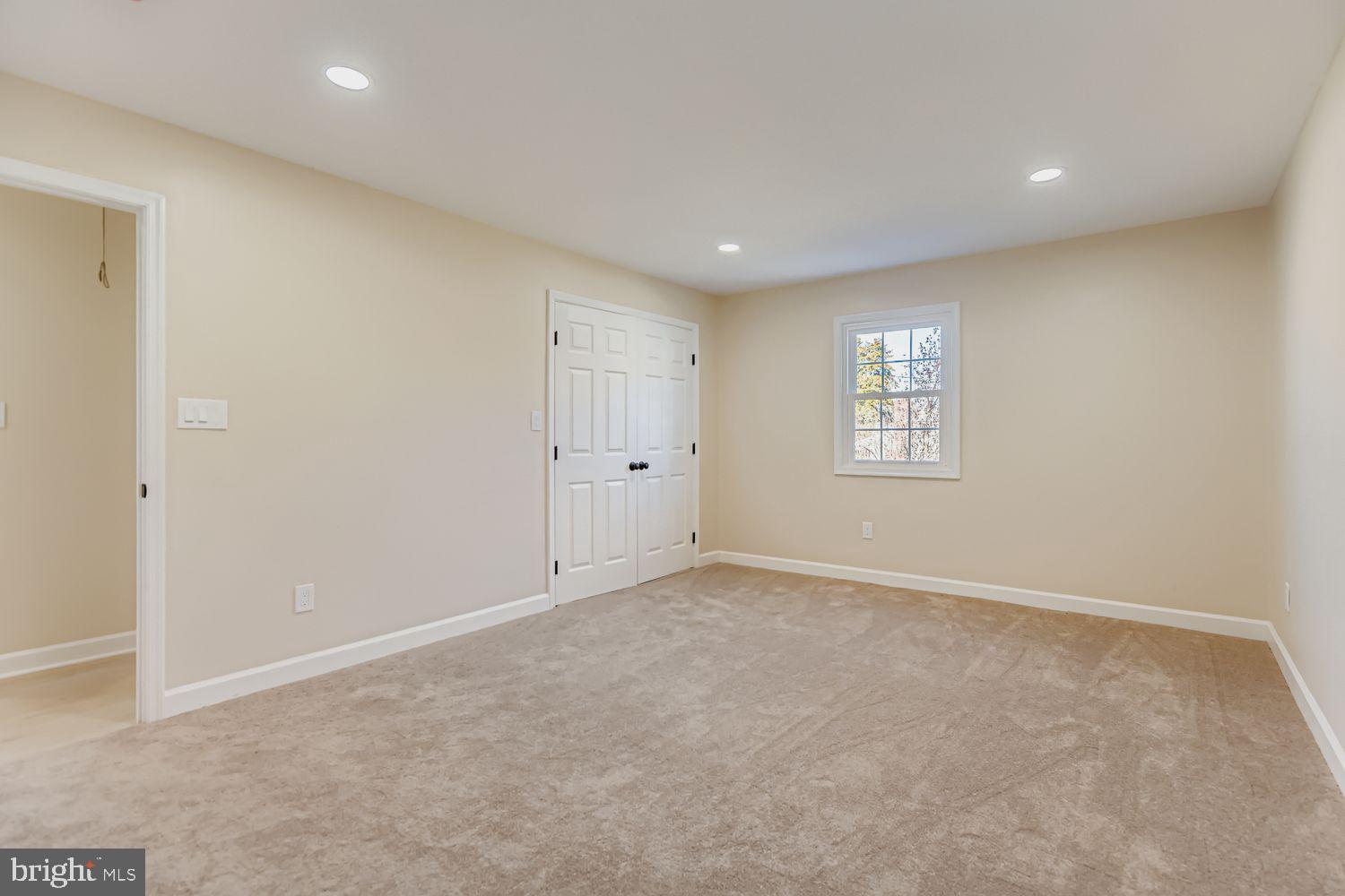 719 South Marlyn Avenue Baltimore, MD 21221 - Photo 17 of 39 a view of an empty room with a window
