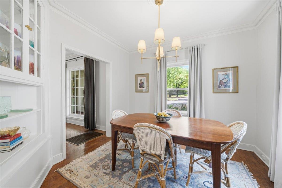 160 Picardy Street Memphis, TN 38111 - Photo 15 of 38 a view of a dining room with furniture window and wooden floor