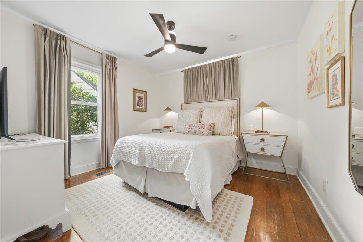 160 Picardy Street Memphis, TN 38111 - Photo 25 of 38 a bedroom with a bed and wooden floor
