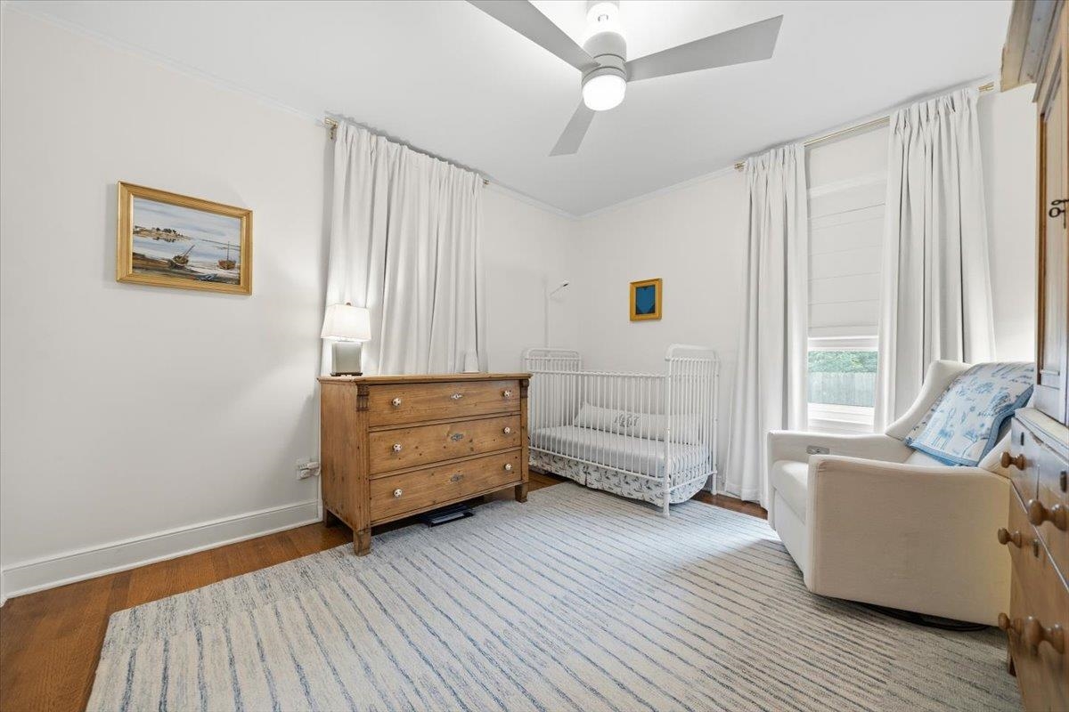 160 Picardy Street Memphis, TN 38111 - Photo 27 of 38 a living room with furniture and a baby crib