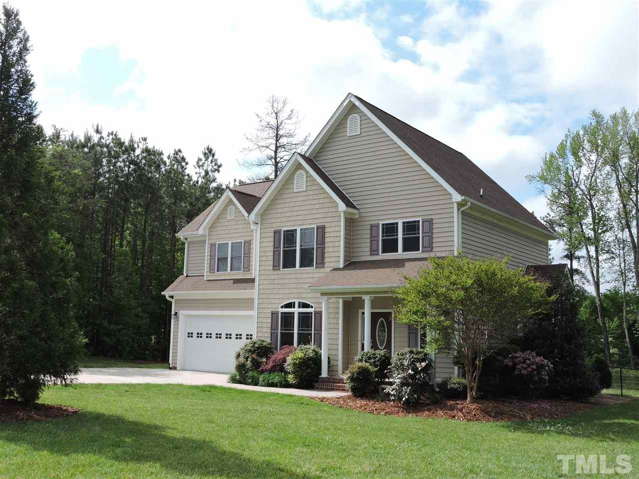 223 Fletcher Ridge Road Timberlake, NC 27583 - Photo 1 of 24 a aerial view of a house with a yard
