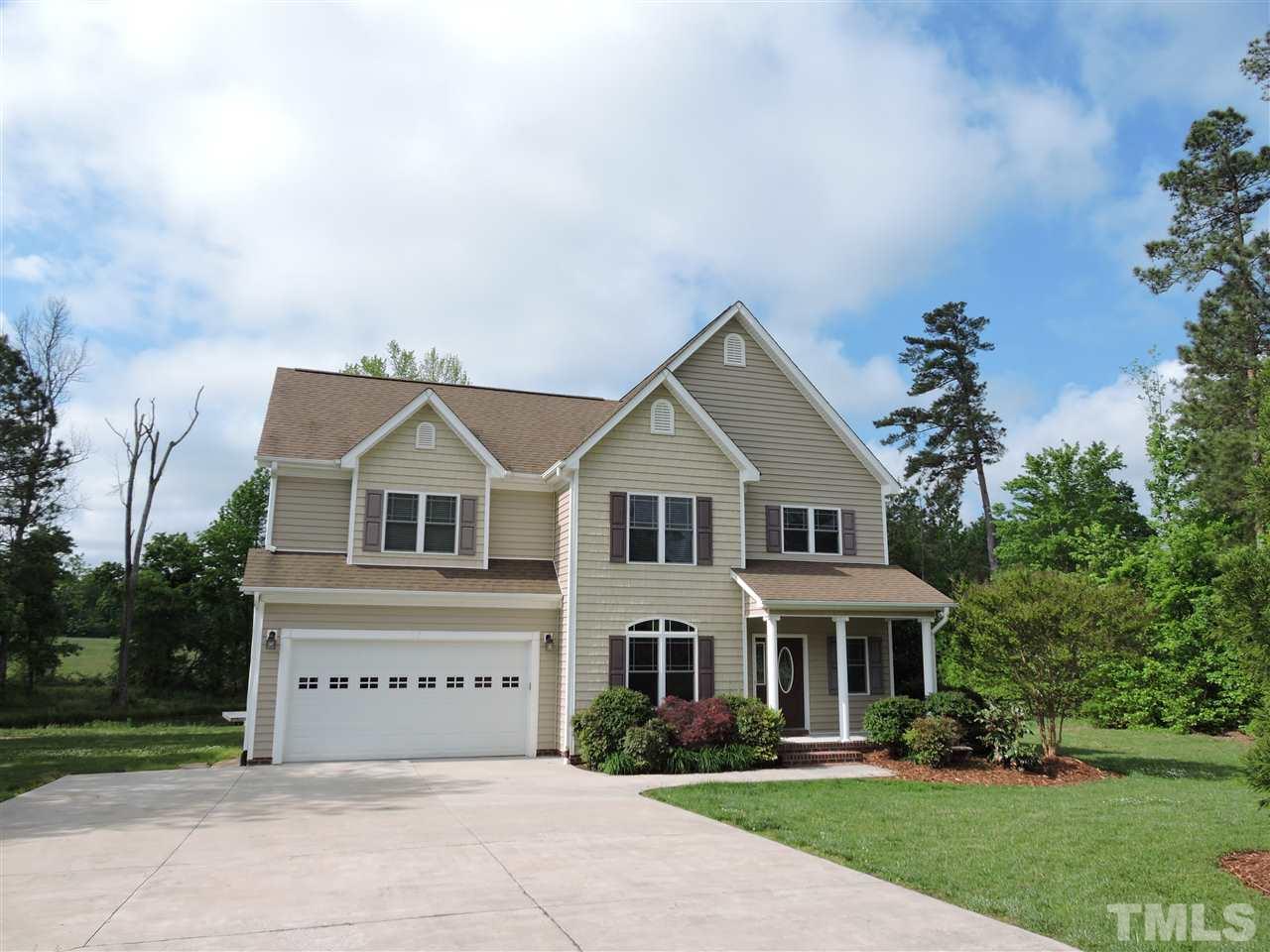 223 Fletcher Ridge Road Timberlake, NC 27583 - Photo 23 of 24 front view of house with a yard