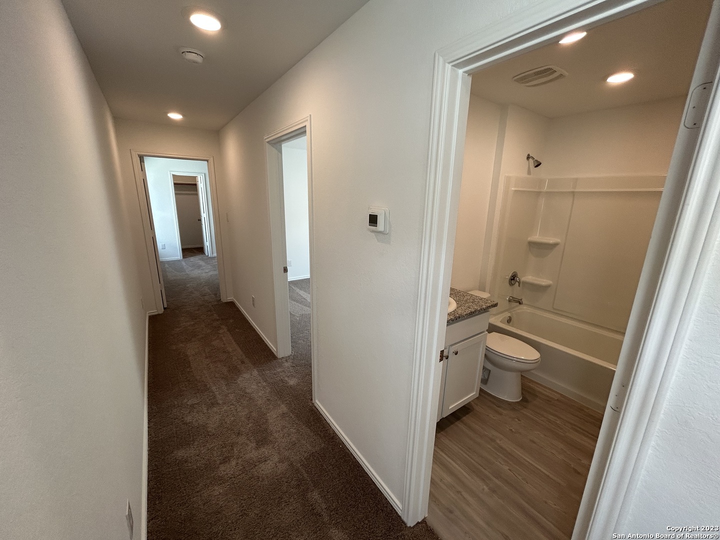11026 Tree Line San Antonio, TX 78223 - Photo 14 of 31 a bathroom with a sink and toilet