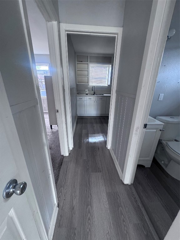1306 Weiss Street Houston, TX 77009 - Photo 4 of 10 a view of a hallway view with wooden floor and staircase