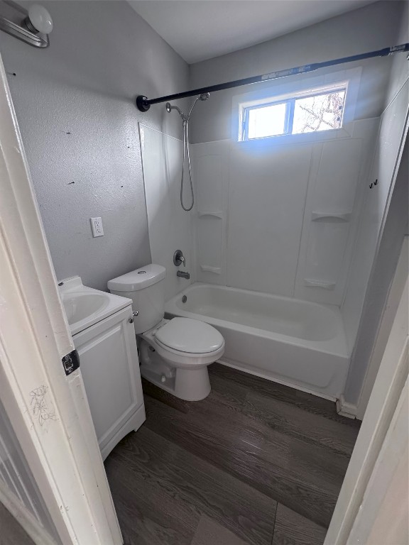 1306 Weiss Street Houston, TX 77009 - Photo 5 of 10 a bathroom with a toilet a sink and bathtub