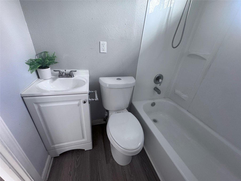 1306 Weiss Street Houston, TX 77009 - Photo 6 of 10 a bathroom with a sink and a toilet