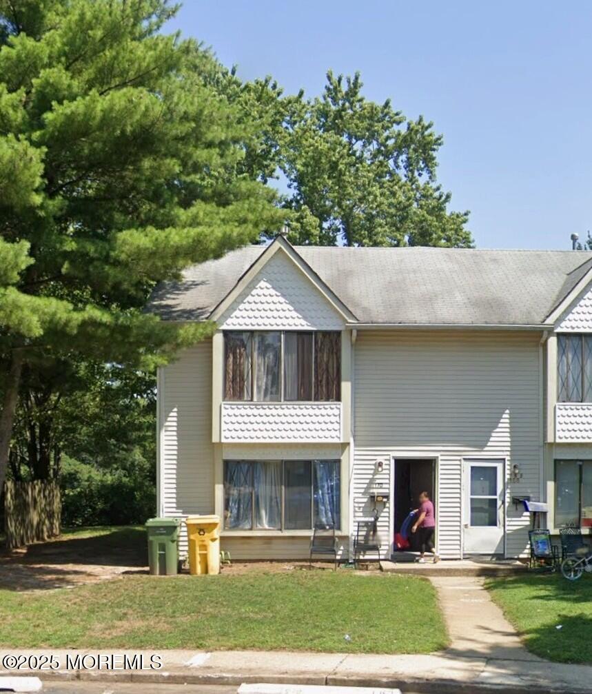 158 Governors Road Lakewood, NJ 08701 - Photo 1 of 1 a front view of a house with a yard