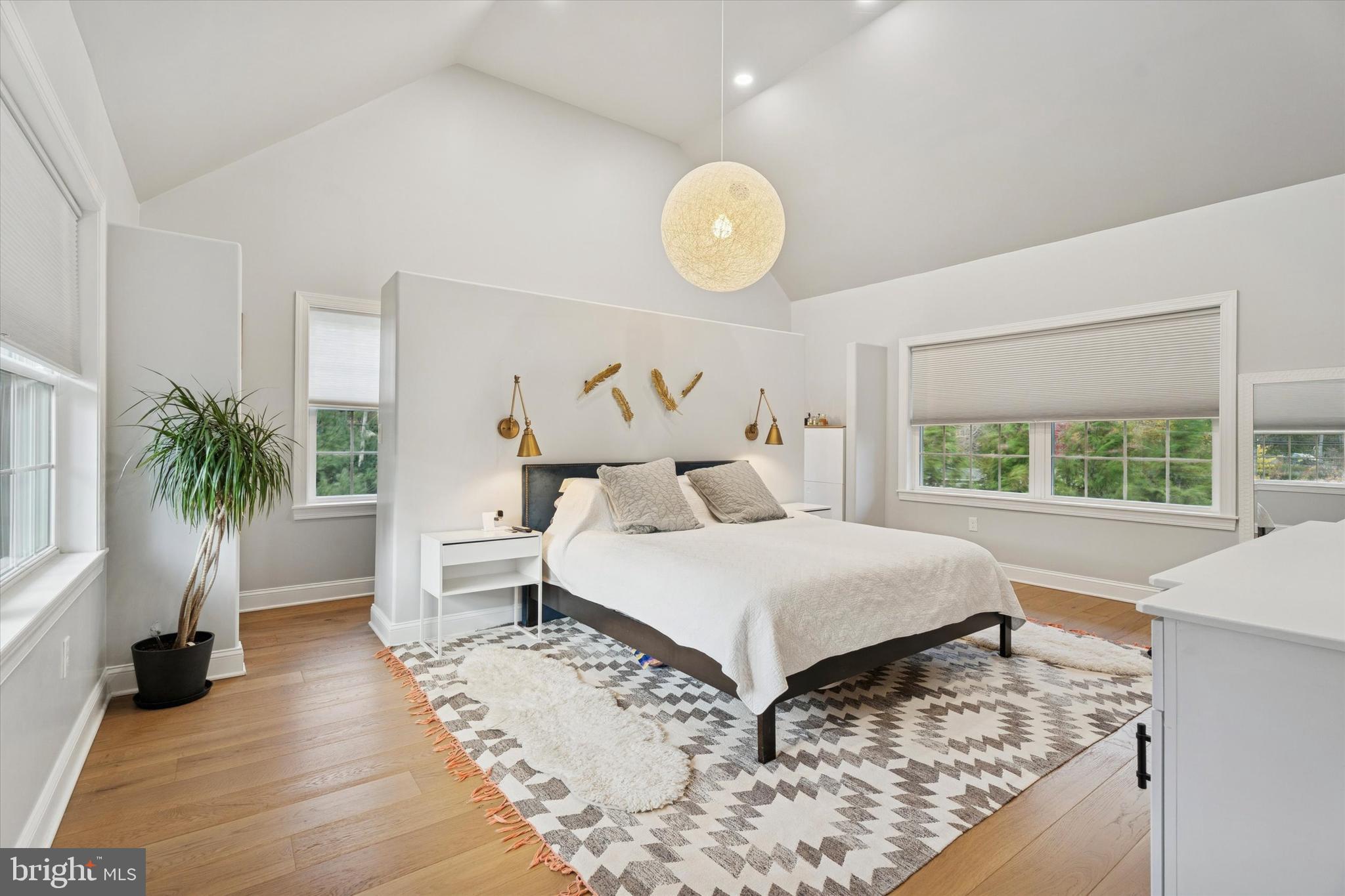 603 Old Gulph Road Penn Valley, PA 19072 - Photo 11 of 58 a bed room with a bed and a potted plant