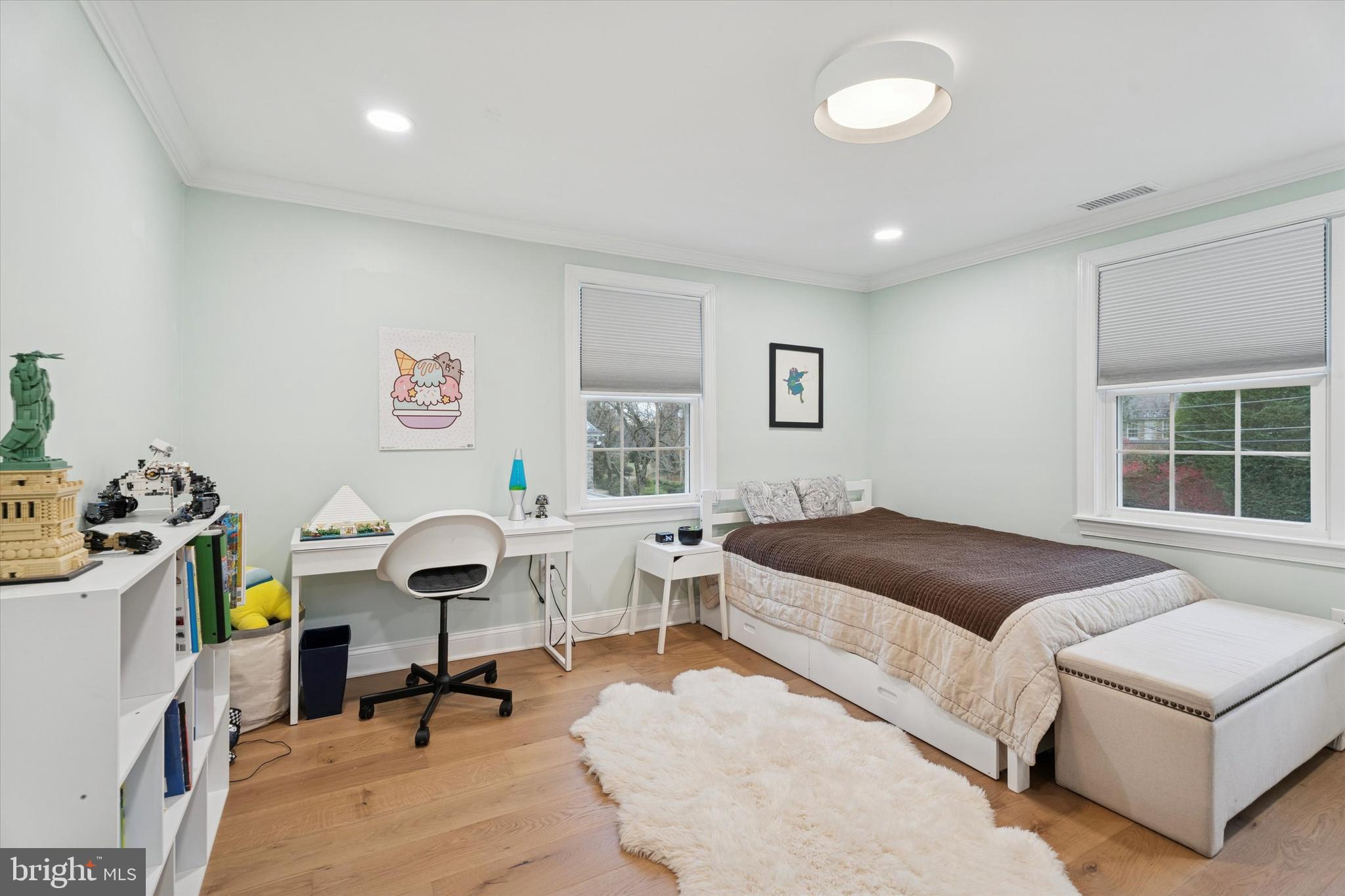 603 Old Gulph Road Penn Valley, PA 19072 - Photo 20 of 58 a bedroom with a bed and a desk