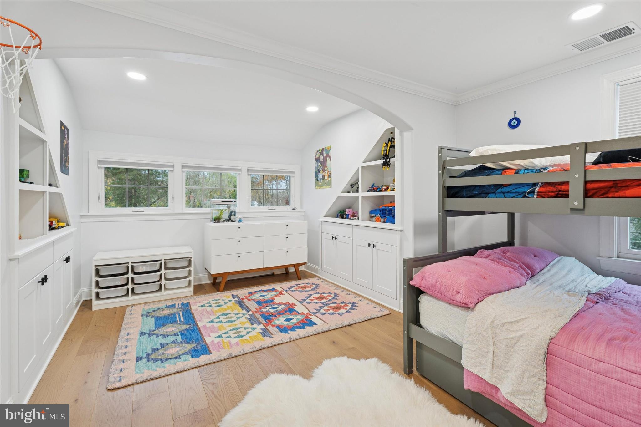 603 Old Gulph Road Penn Valley, PA 19072 - Photo 22 of 58 a bedroom with furniture and a book shelf