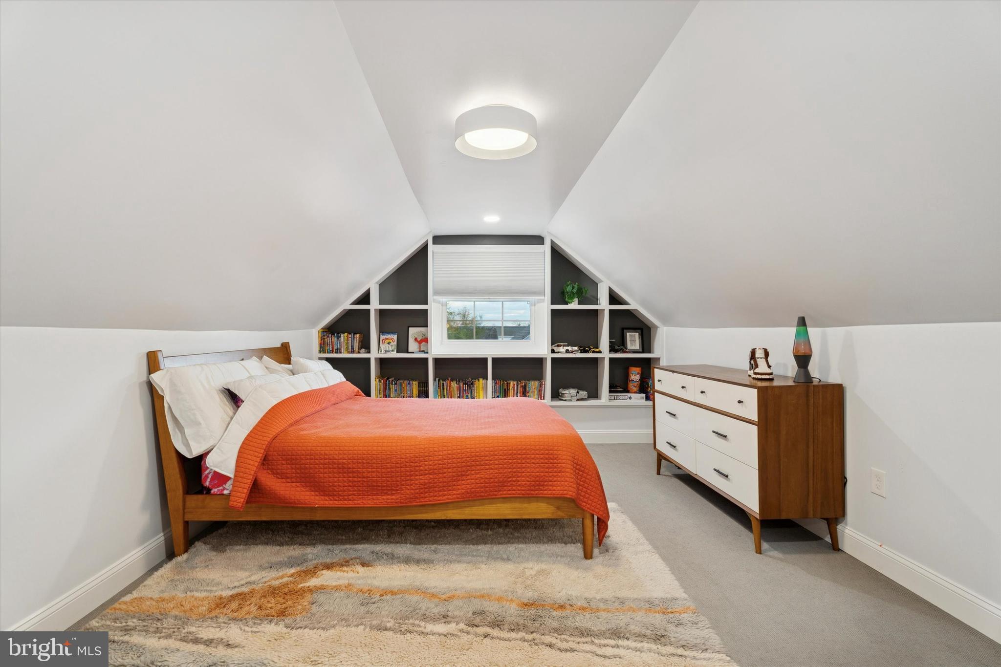 603 Old Gulph Road Penn Valley, PA 19072 - Photo 26 of 58 a bedroom with a bed and a large window