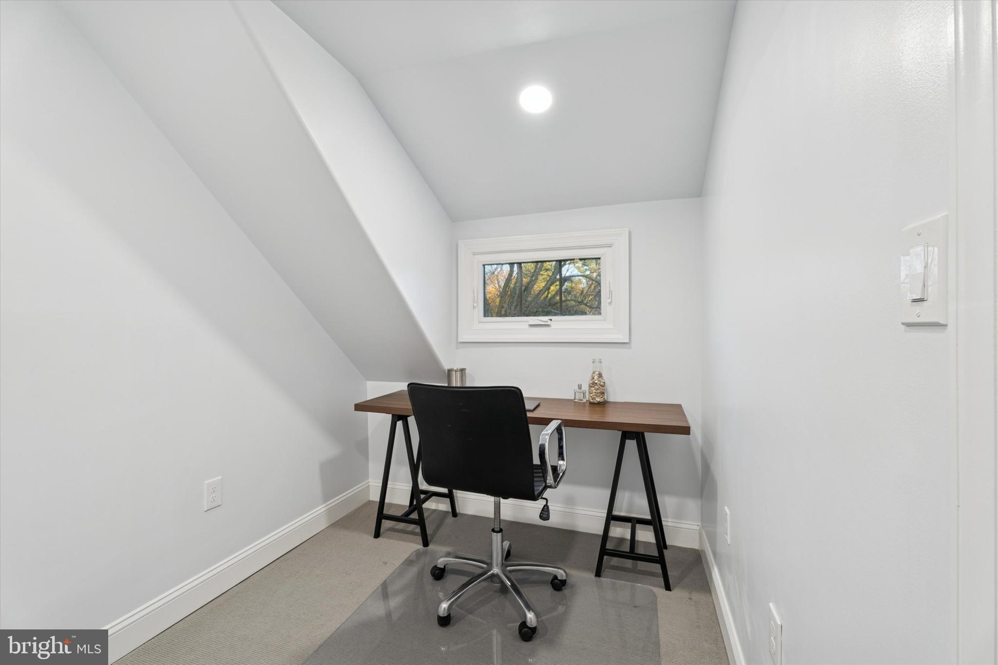 603 Old Gulph Road Penn Valley, PA 19072 - Photo 29 of 58 a view of a workspace with furniture and a window