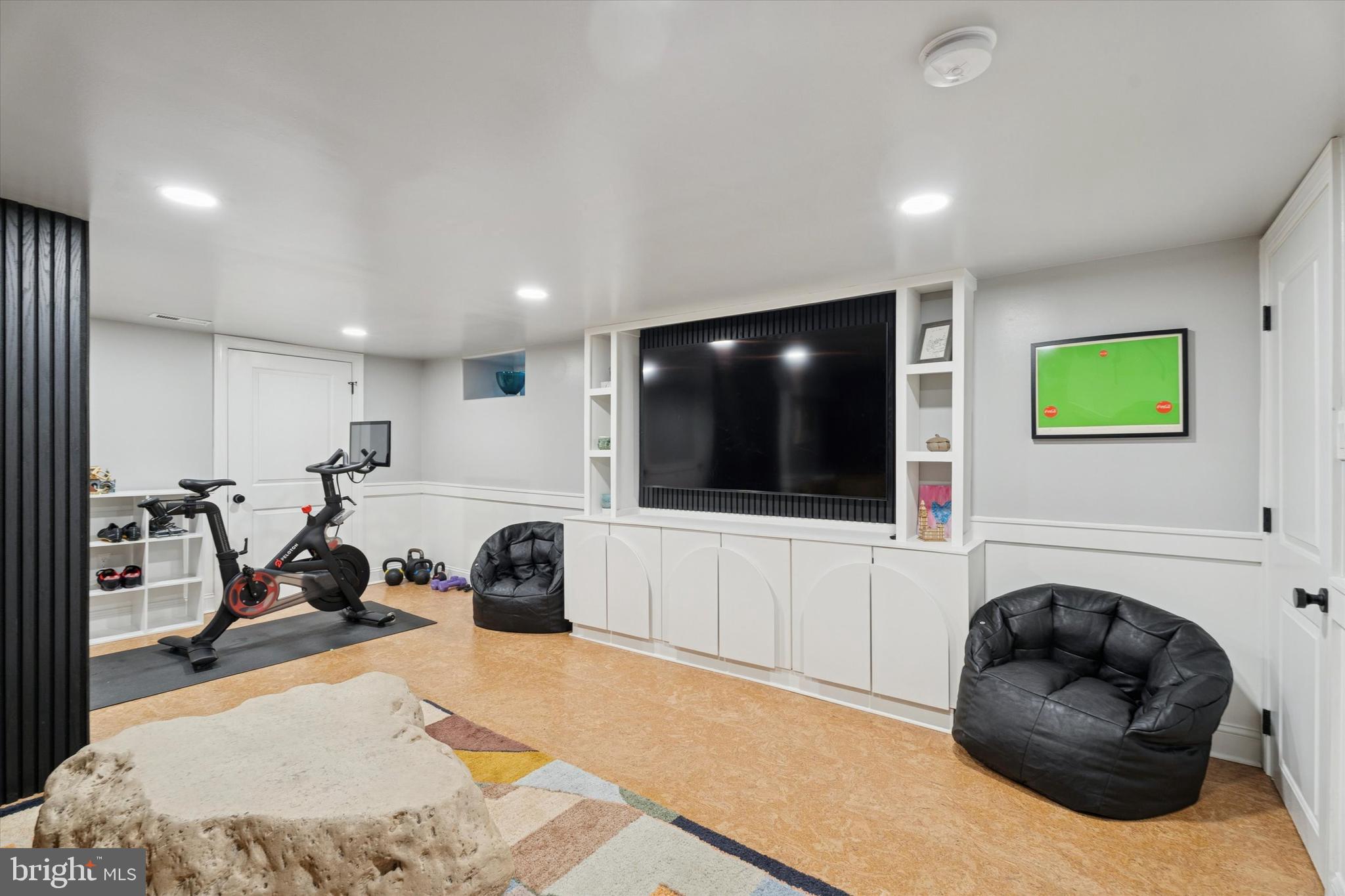 603 Old Gulph Road Penn Valley, PA 19072 - Photo 31 of 58 a living room with furniture and a flat screen tv