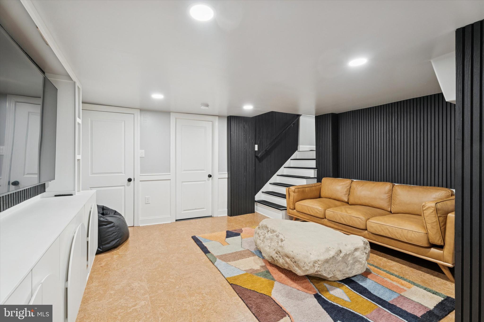 603 Old Gulph Road Penn Valley, PA 19072 - Photo 32 of 58 a living room with furniture and a wooden floor