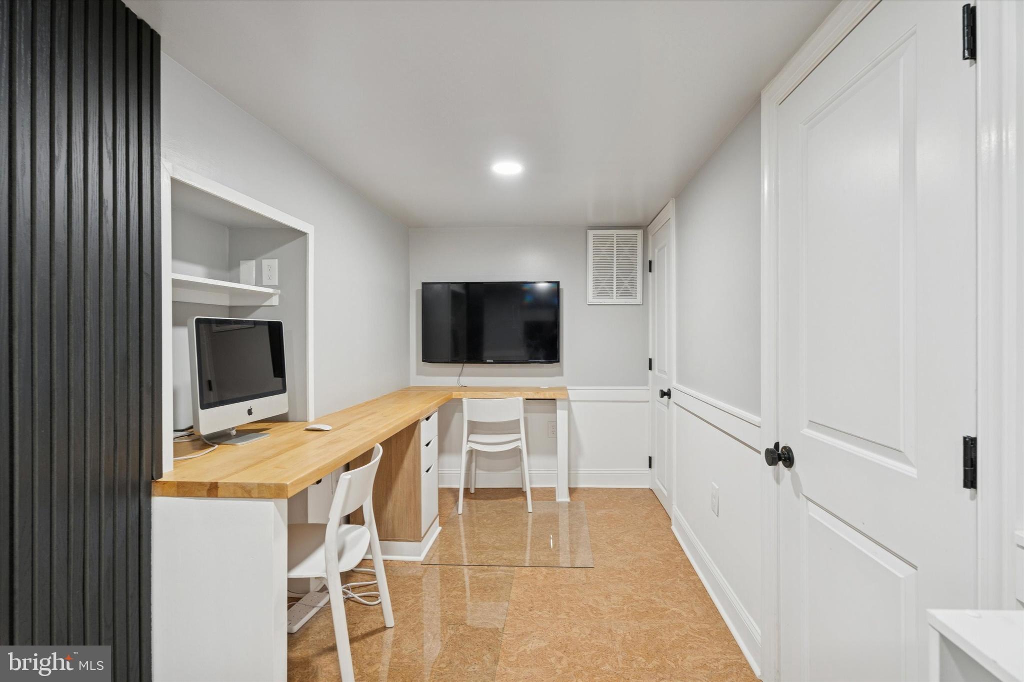 603 Old Gulph Road Penn Valley, PA 19072 - Photo 33 of 58 a view of a livingroom with furniture and flat screen tv