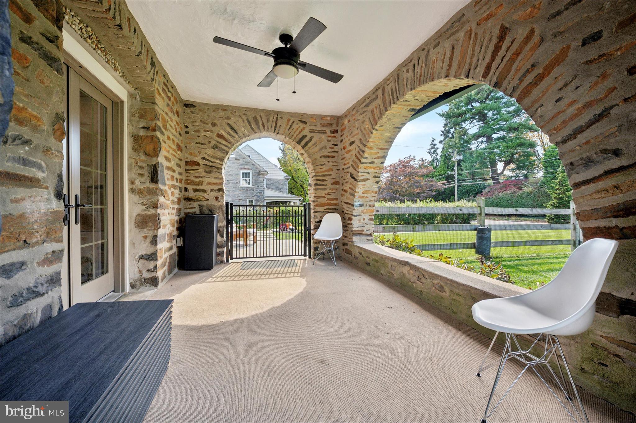 603 Old Gulph Road Penn Valley, PA 19072 - Photo 37 of 58 a very nice looking room with a large window and a fireplace