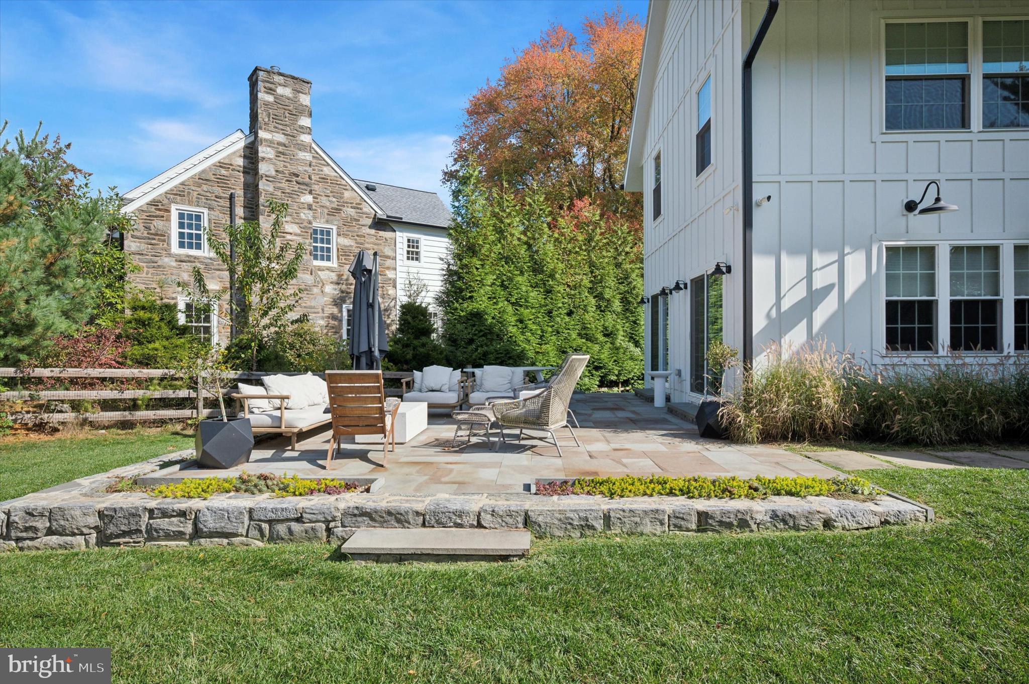 603 Old Gulph Road Penn Valley, PA 19072 - Photo 39 of 58 a view of a house with backyard porch and sitting area