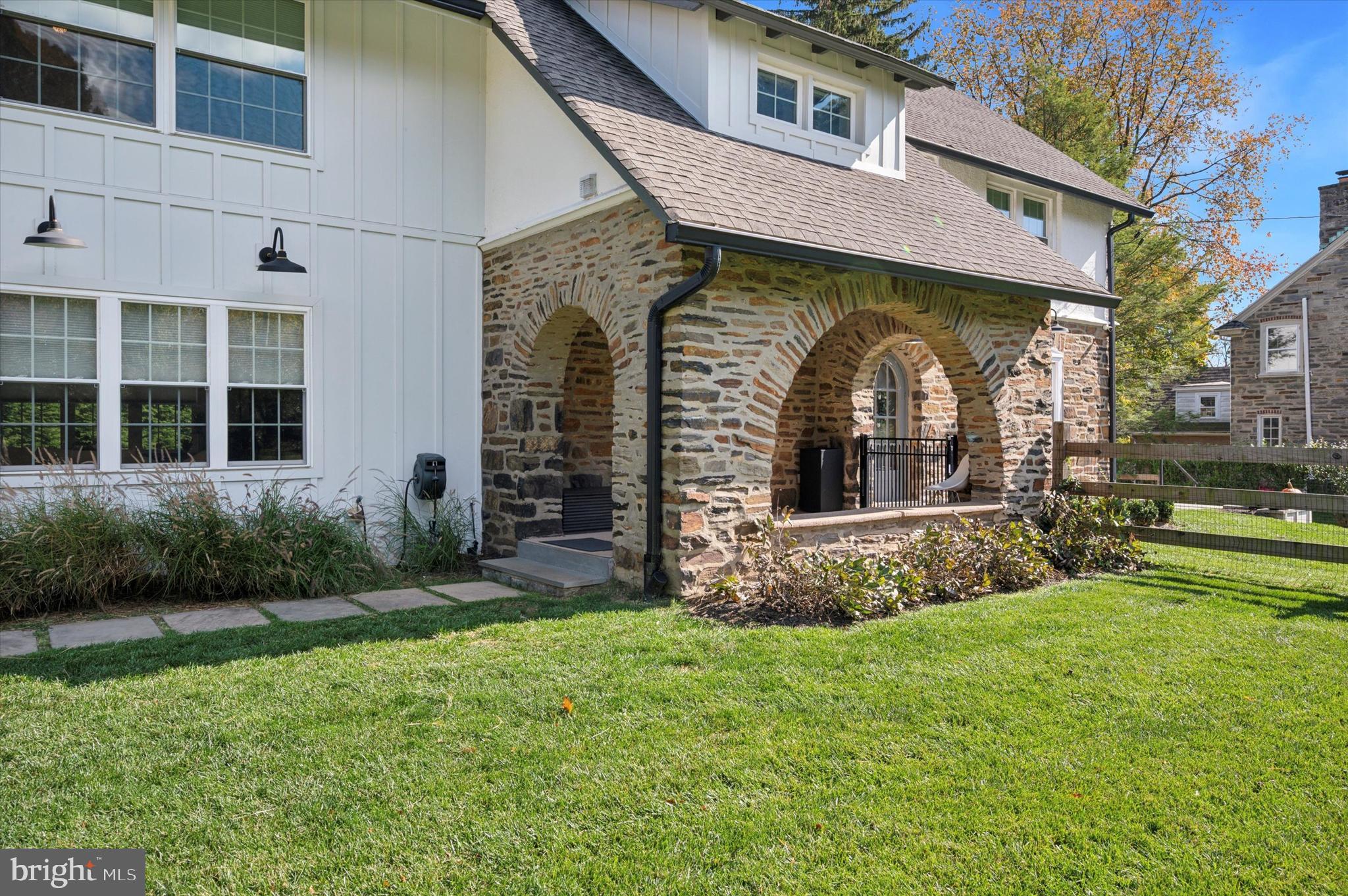 603 Old Gulph Road Penn Valley, PA 19072 - Photo 46 of 58 a front view of a house with garden