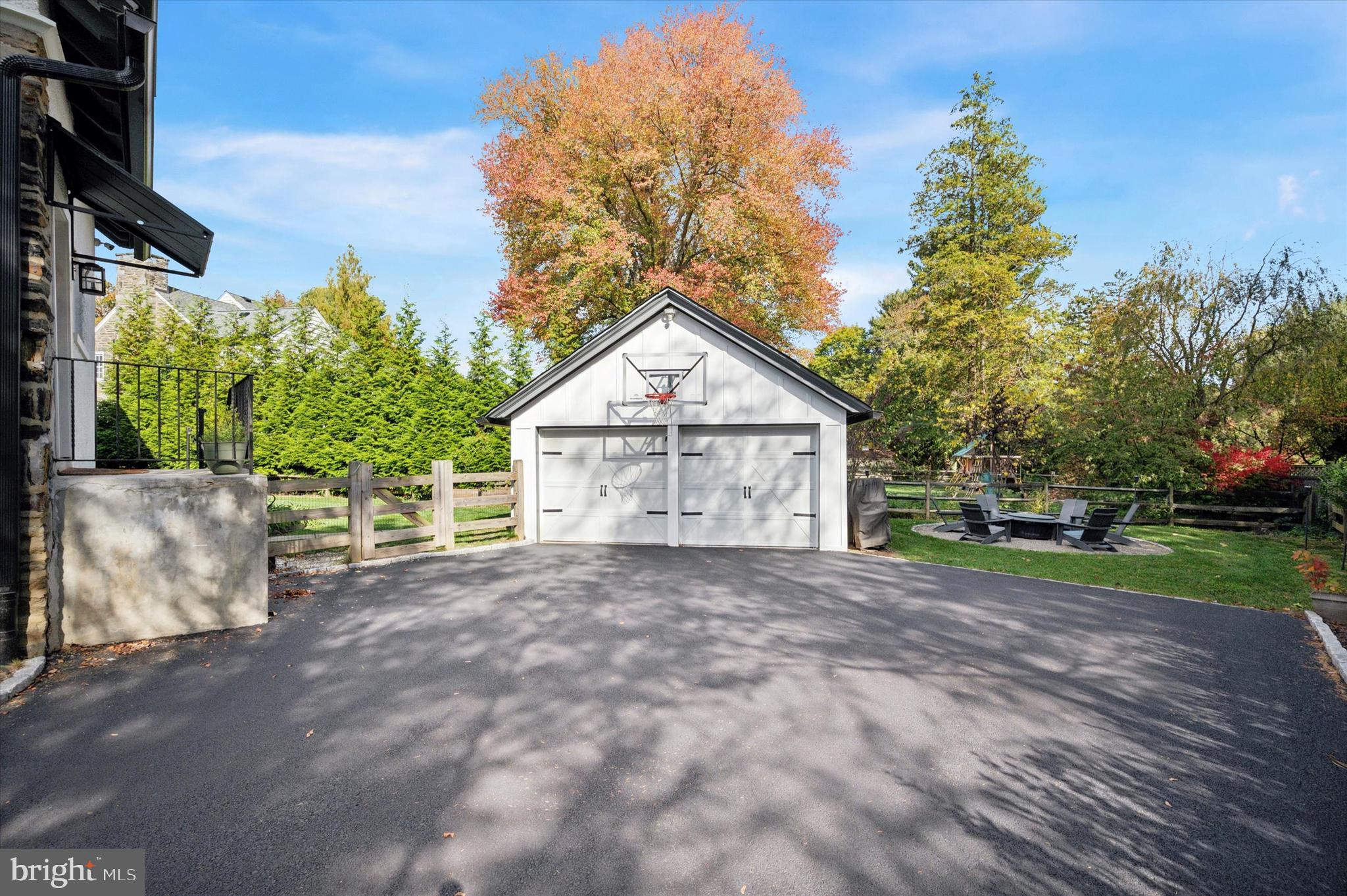 603 Old Gulph Road Penn Valley, PA 19072 - Photo 49 of 58 a view of a house with a yard and large trees