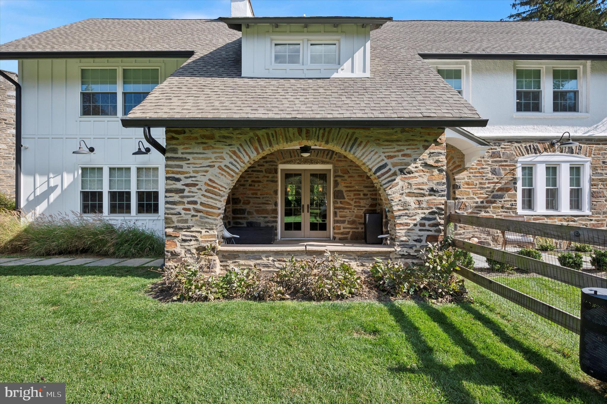 603 Old Gulph Road Penn Valley, PA 19072 - Photo 52 of 58 a front view of a house with a garden
