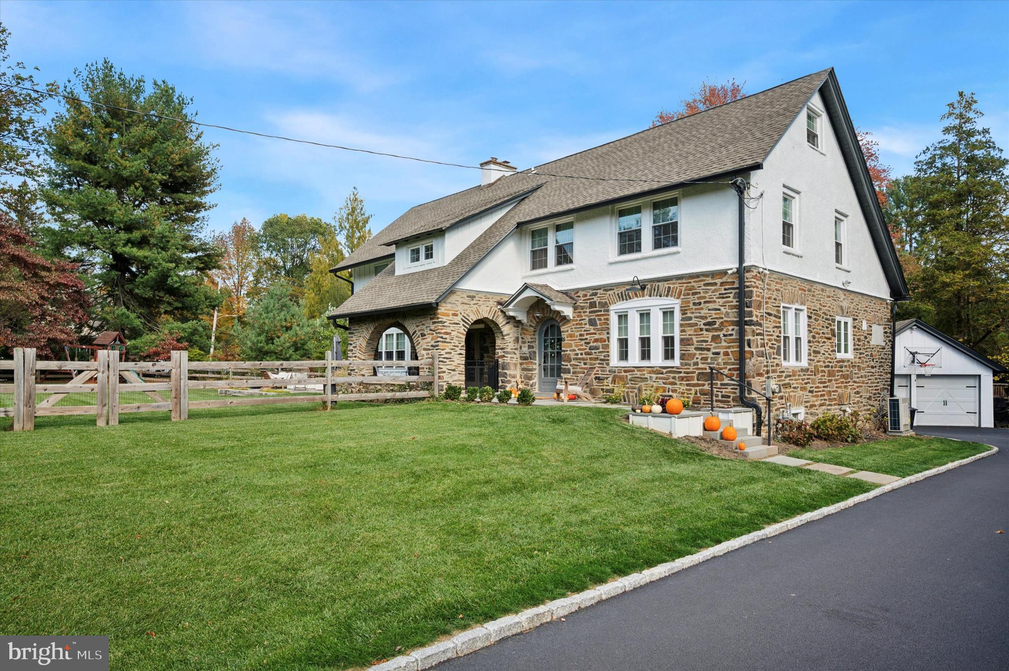 603 Old Gulph Road Penn Valley, PA 19072 - Photo 54 of 58 a front view of a house with a garden