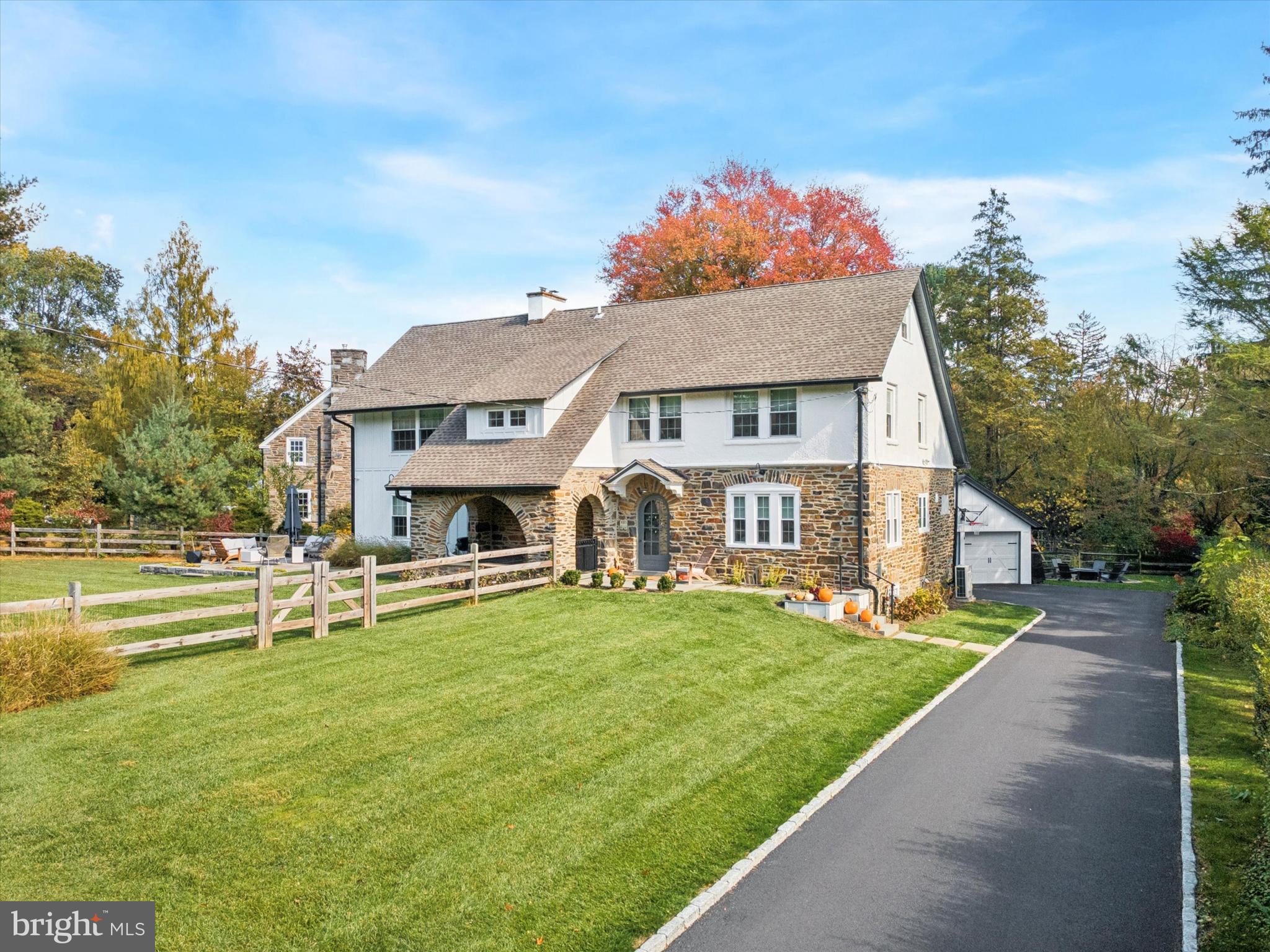 603 Old Gulph Road Penn Valley, PA 19072 - Photo 55 of 58 a front view of house with yard and green space